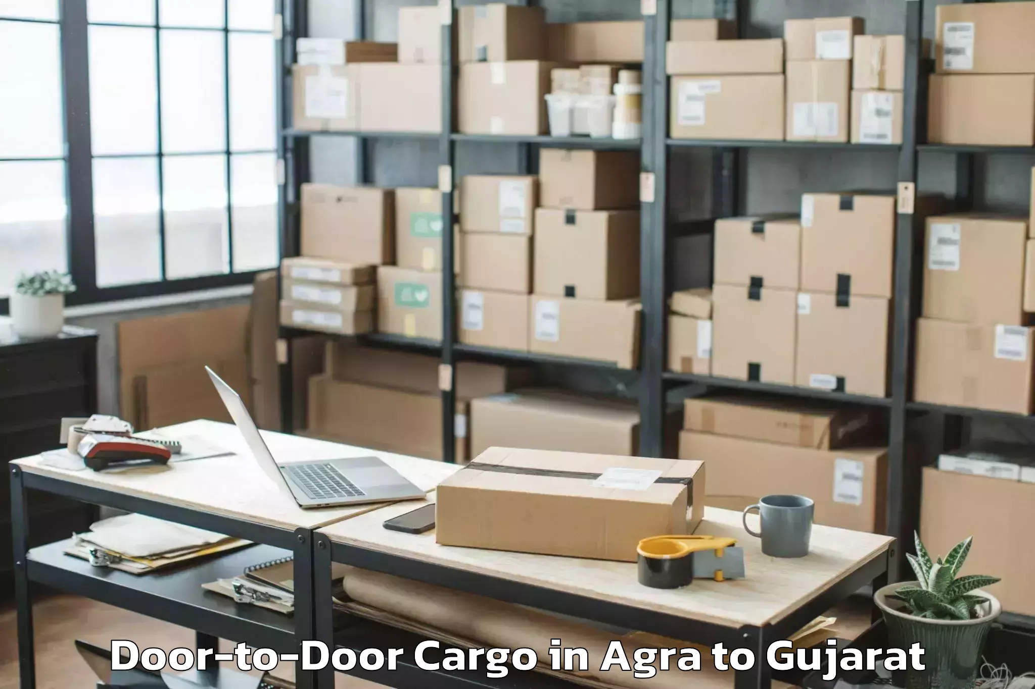 Book Agra to Thasra Door To Door Cargo Online